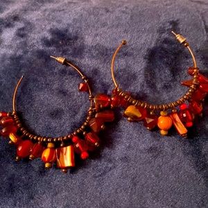 Red hoop earrings
